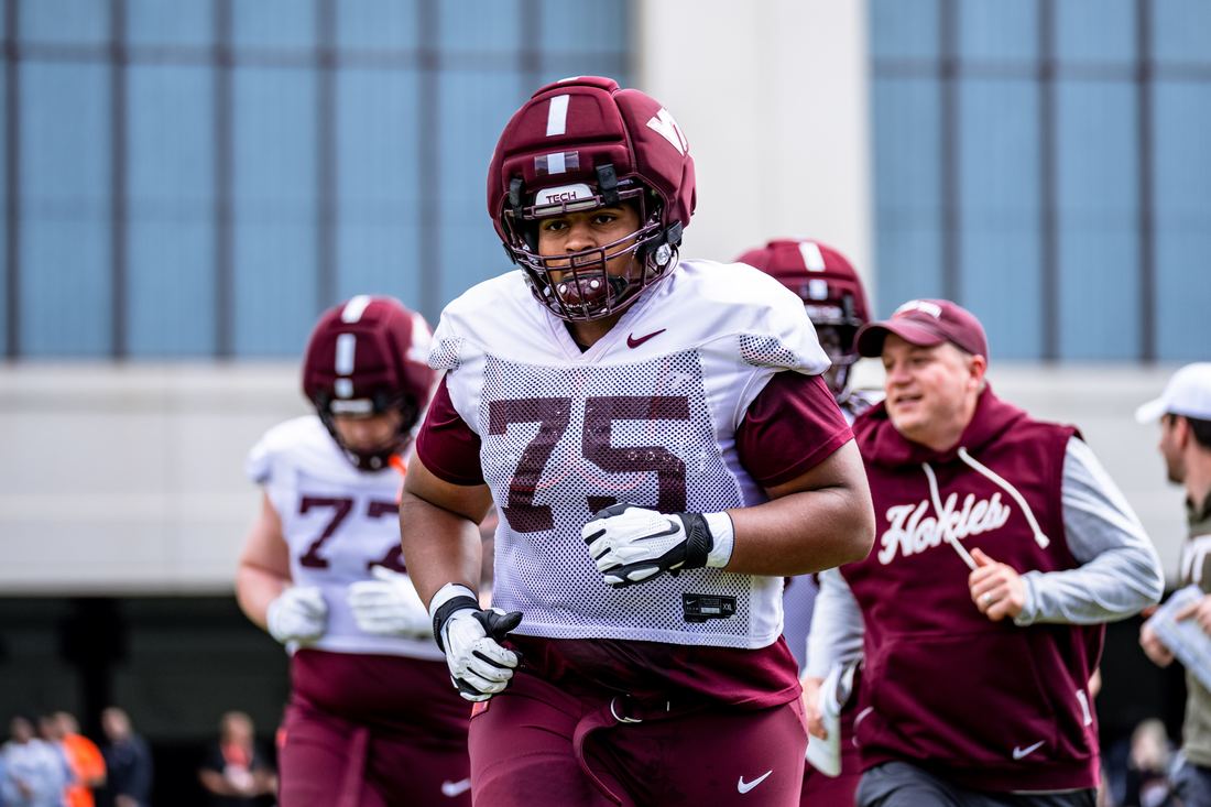 Benjamin Eziuka working through a rep during a Virginia Tech practice.